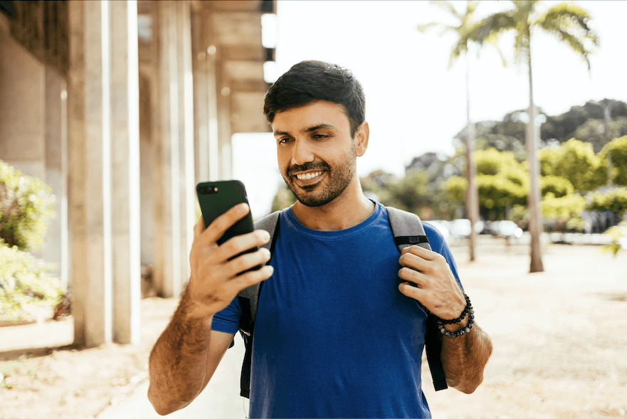 traveler in Brazil using eSIM in his phone